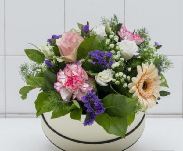 Mixed flowers in a hatbox
